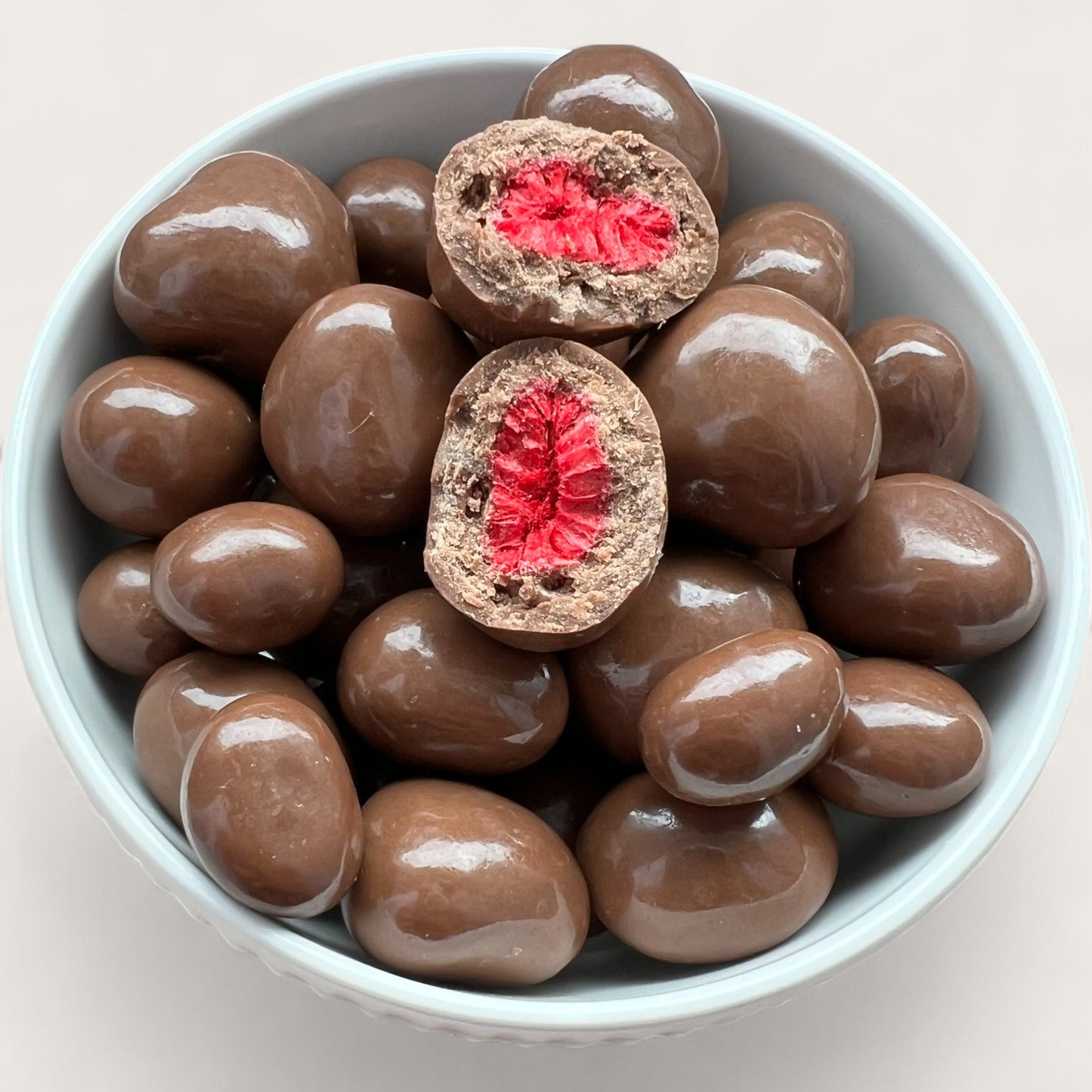 Gefriergetrocknete Himbeeren in Vollmilchschokolade – 100 g - Kemberly® GmbH