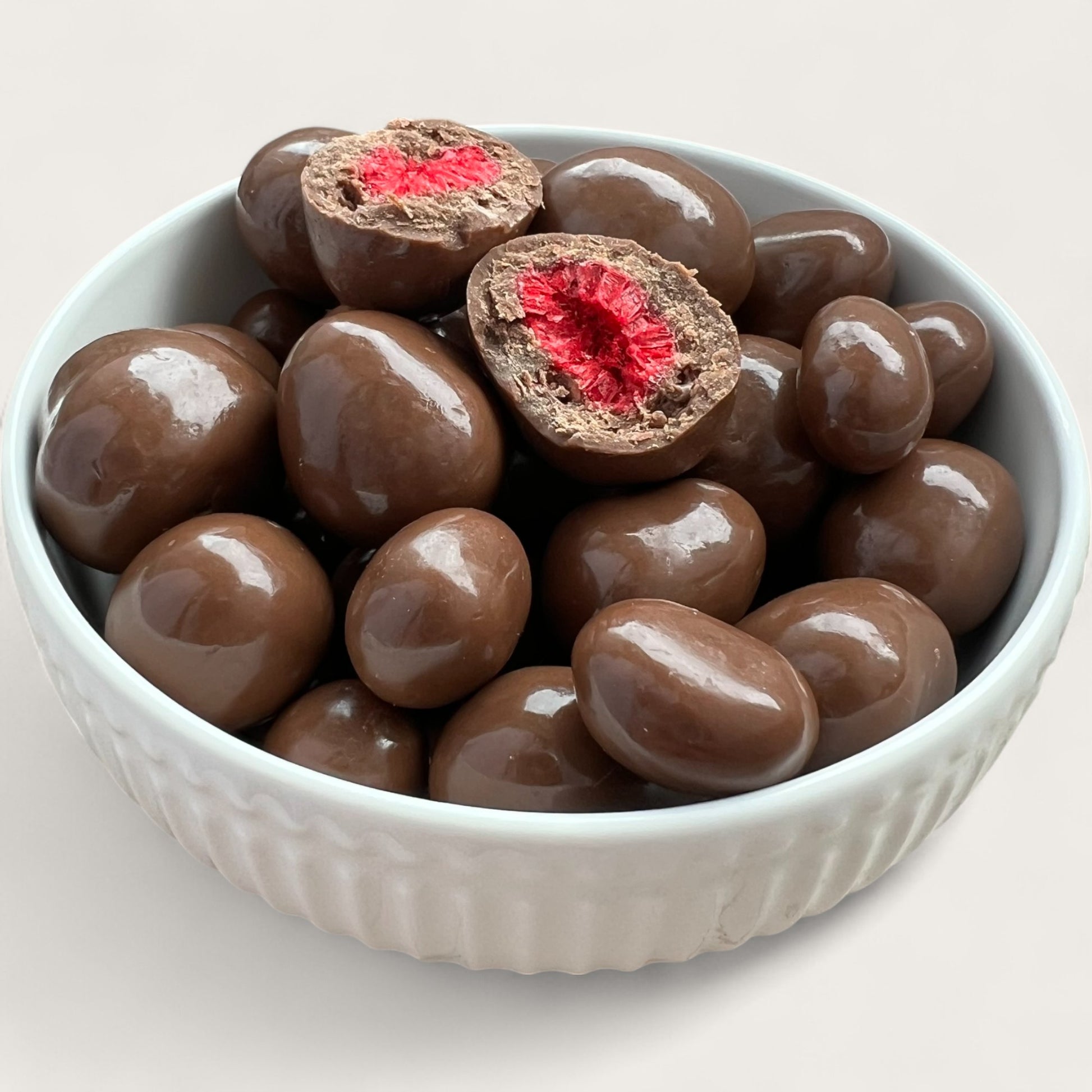 Gefriergetrocknete Himbeeren in Vollmilchschokolade – 100 g - Kemberly® GmbH